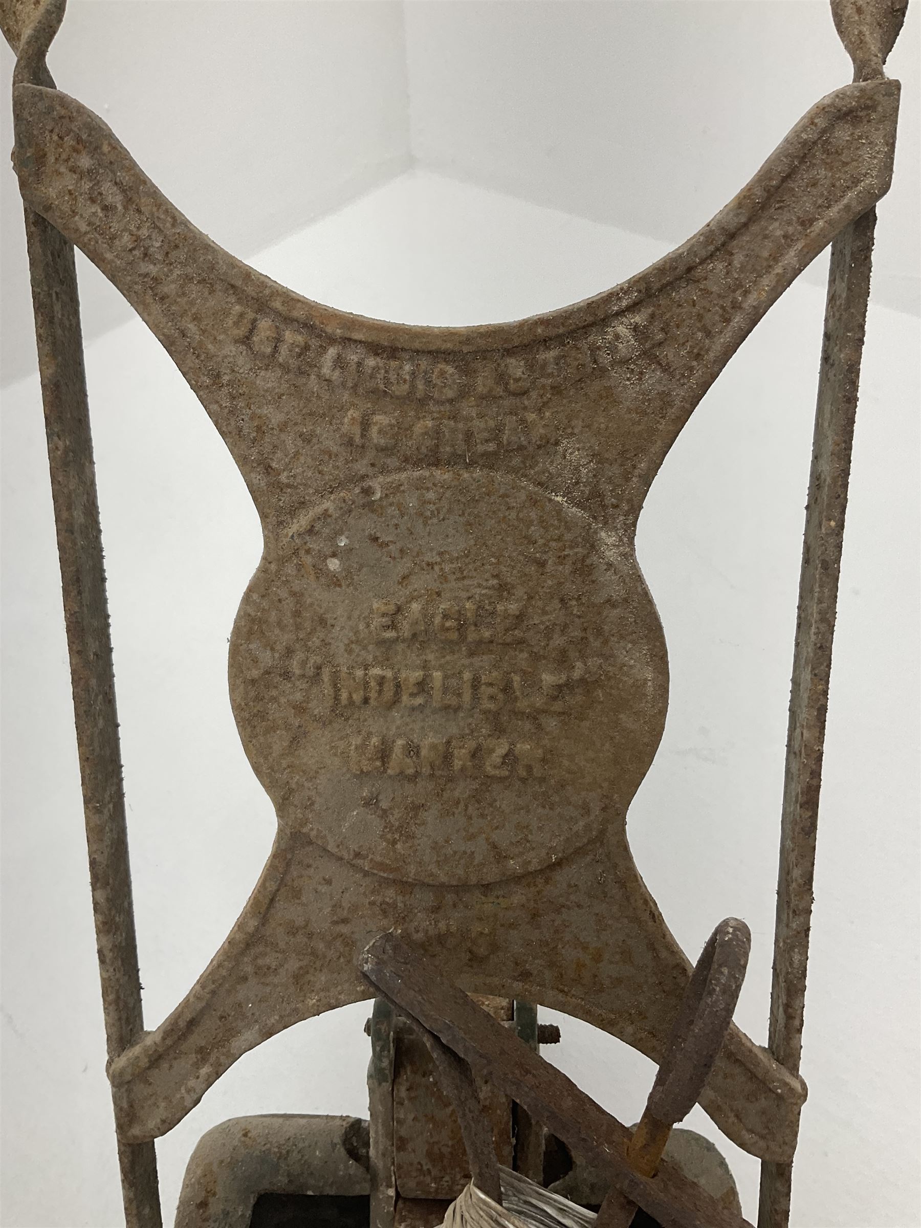 Vintage cast iron tennis court line marker, together with peg and line guide 