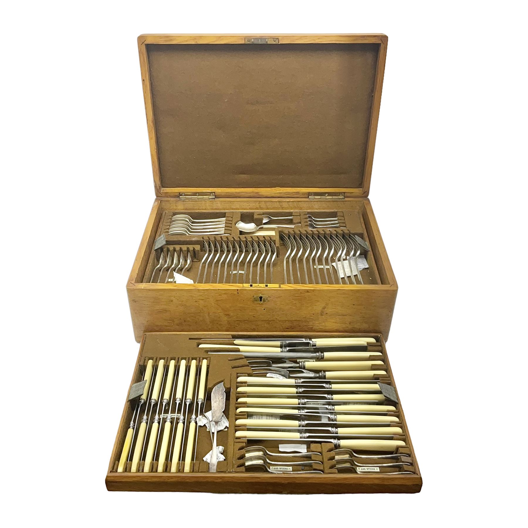 Mappin & Webb silver plated canteen of cutlery, the oak case with hinged lid two two removable trays, and sunken brass handles, H19cm, L52cm