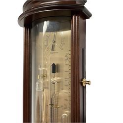 20th century Tendency Barometer -  to the design of Alexander Adie the 19th century inventor of the Sympiesometer, in a mahogany convex case with astragal moulding to the top and base, with an engraved silvered register, spirit thermometer, comparison Sympiesometer bulb and storm glass, adjustable vernier and hygrometer.
