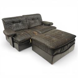 Mid 20th century leather upholstered two-piece sectional sofa with footstool, buttoned back cushions with stitched panel decoration, padded armrests and deep seat cushions, raised on concealed supports