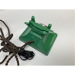 Jade green Bakelite telephone, of pyramid form with rotary alphabet dial, brown braided handset cord and a base draw, W18cm D14cm H15cm