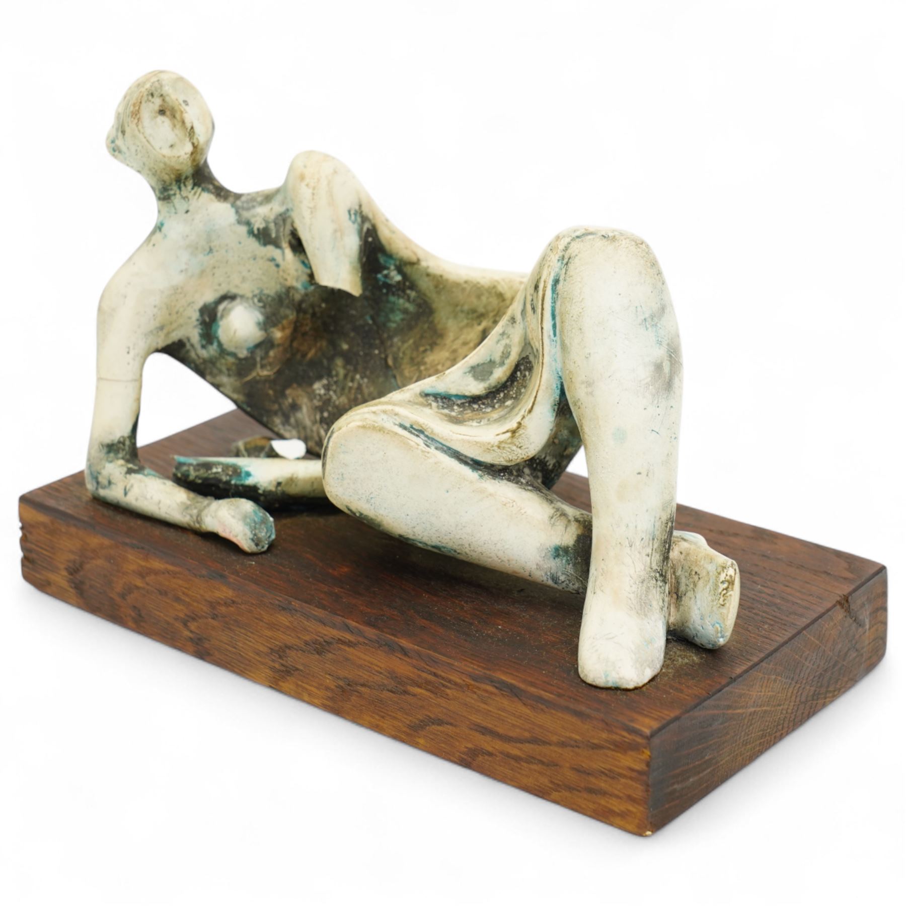 After Henry Moore (British 1898-1986): 'Reclining Figure no.4', plaster maquette sculpture, base marked with affixed catalogue label inscribed 'Reclining Figure no. 4: 1954 Archive 005838', W19cm H12.5cm