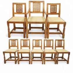 Mouseman - set of eight (7 + 1) oak dining chairs, pierced and carved lattice back over le...