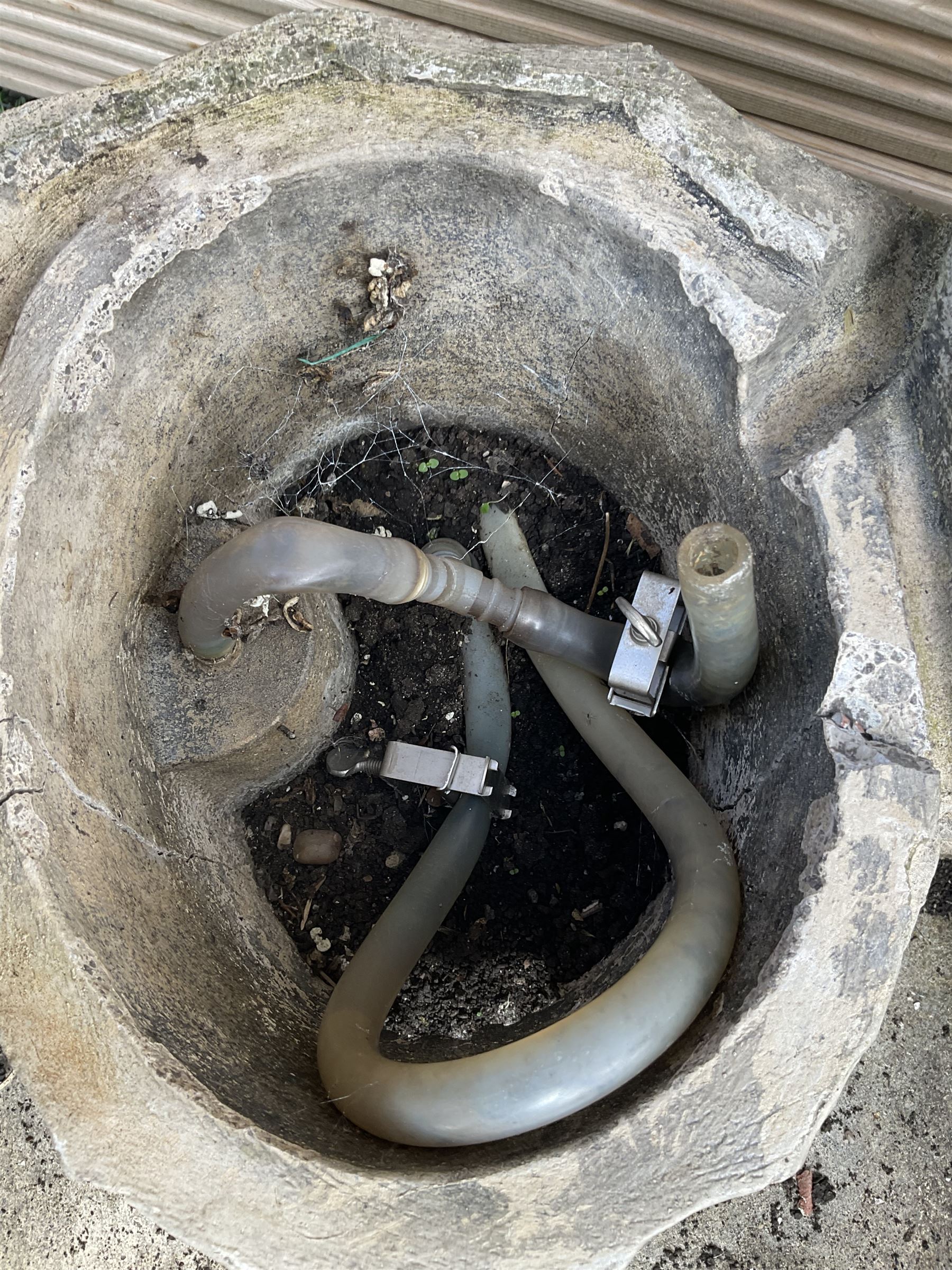 Three section cast stone garden figure of a boy carrying fishing net and a satchel with a water feature together with a cast stone planter on plinth - THIS LOT IS TO BE COLLECTED BY APPOINTMENT FROM DUGGLEBY STORAGE, GREAT HILL, EASTFIELD, SCARBOROUGH, YO11 3TX