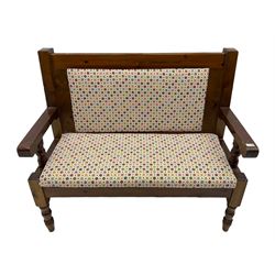 Polished pine bench seat, upholstered in multi-coloured patterned fabric