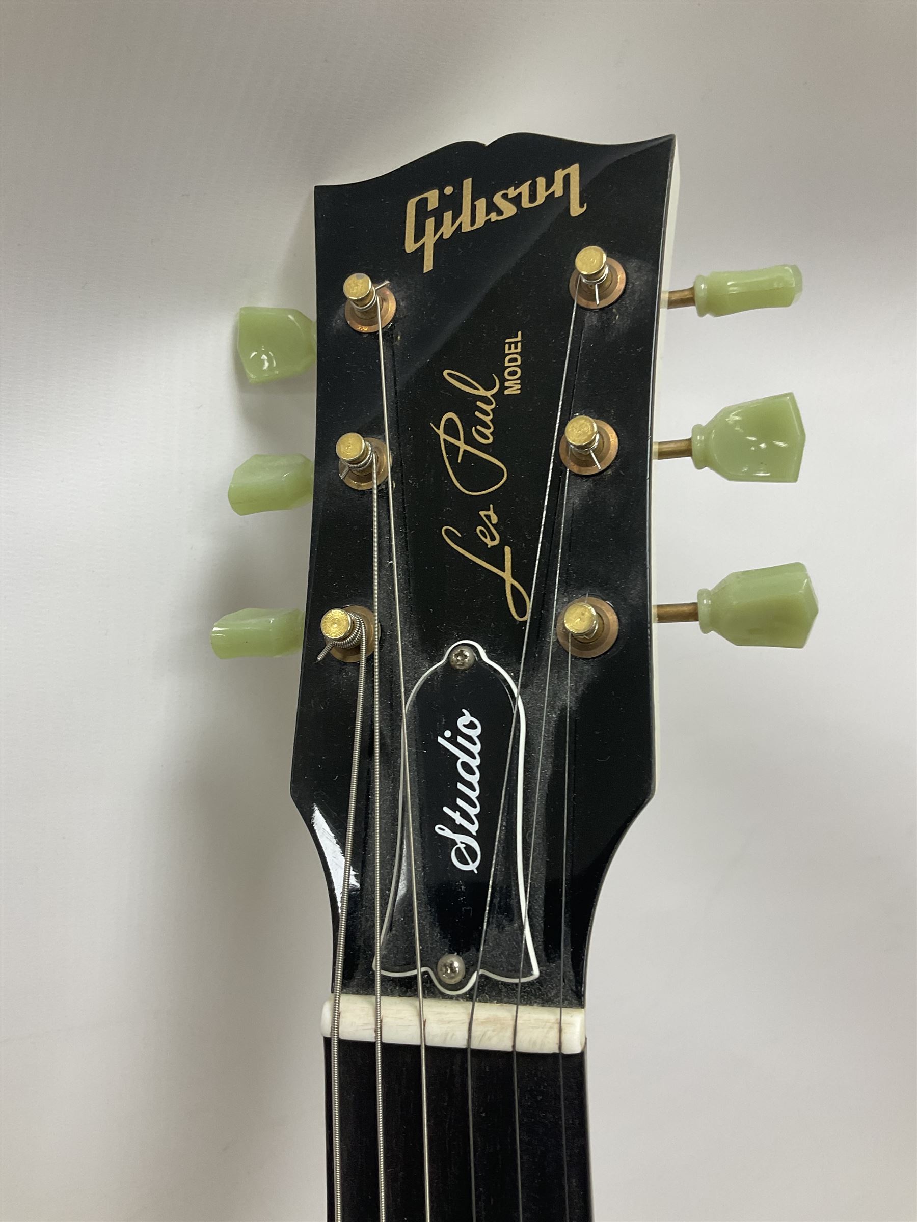 2010 Gibson Les Paul studio guitar, serial no101500537 in white finish with gold and pale green hardware, in Auden soft carry case, guitar L100cm