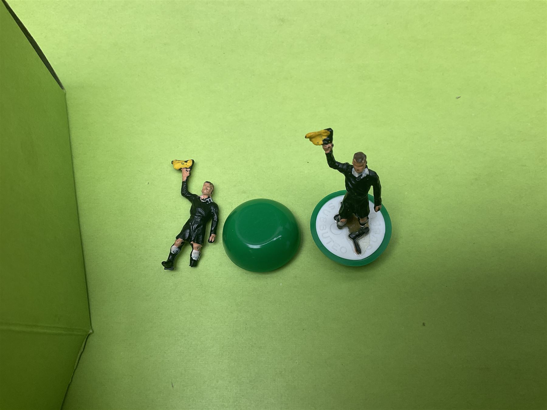 Subbuteo - three boxed sets comprising Football Express with two five-a-side teams and floodlighting; Continental with four teams and accessories; and International Edition Table Rugby with two teams; together with a Real Madrid 1974-75 League Champions pennant (4)