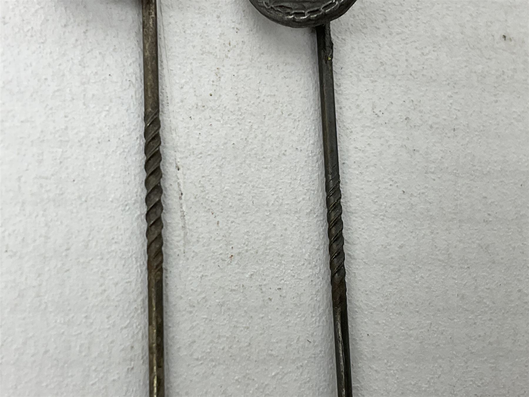 Nine WW2 German lapel pins including five Infantry Assault, Tank Assault etc 