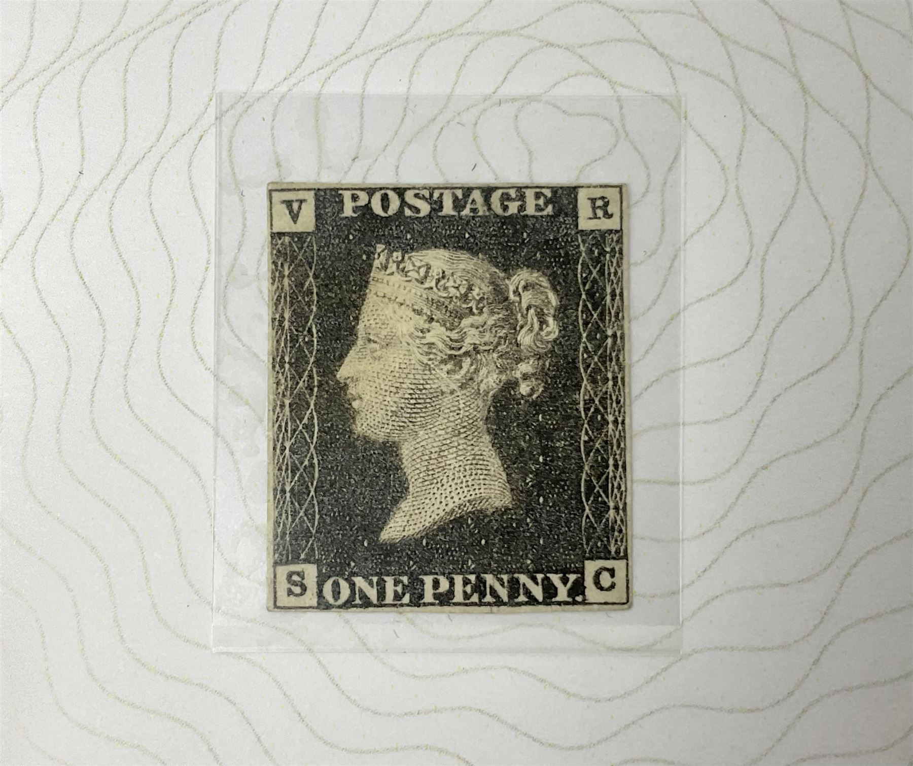 Queen Victoria 'VR Official' penny black, housed in a Westminster folder