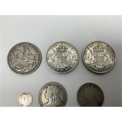 Approximately 65 grams of Great British pre 1920 silver coins and approximately 230 grams of pre 1947 silver coins, including King George V 1935 crown and two King George VI 1937 crowns