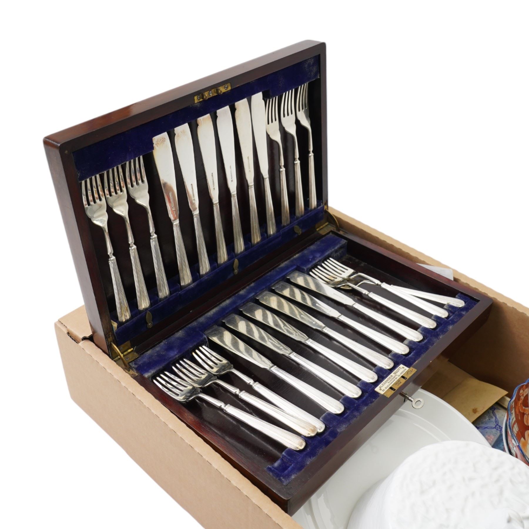 Chinese painting on rice paper, together with two Imari bowls, and cases of cutlery