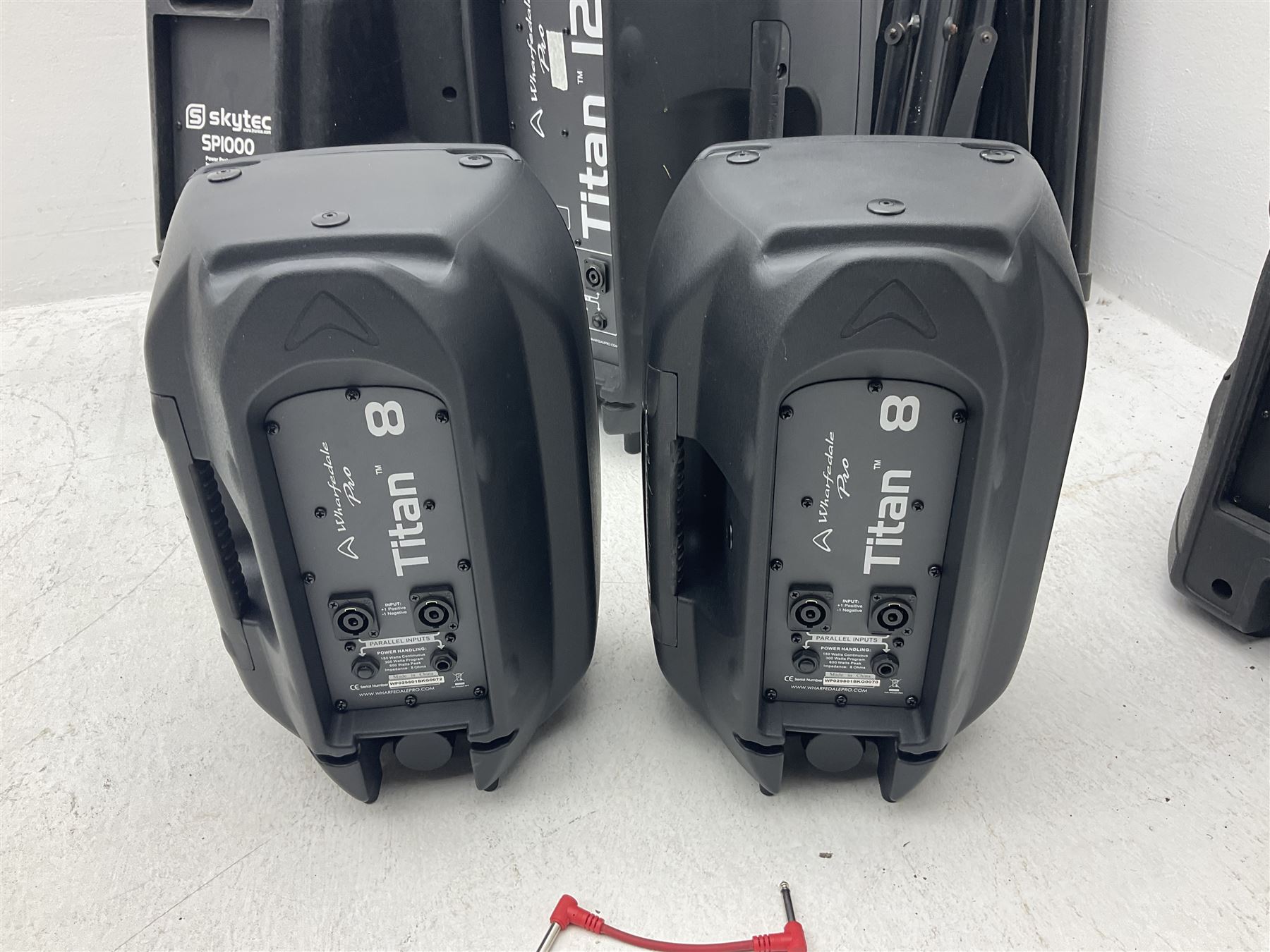 Wharfedale Pro Titan 12 speaker, pair of Wharfedale pro titan 8 speakers, Skytec SP1000 speaker, img stage line PAB-110 MK2 speaker and five speaker stands of various sizes (10)