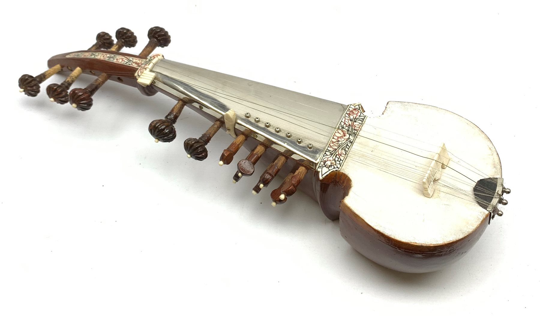 Indian sarangi multi-stringed instrument, the hardwood base with decorative bone inlay and mounts and metal covered fingerboard, L59cm