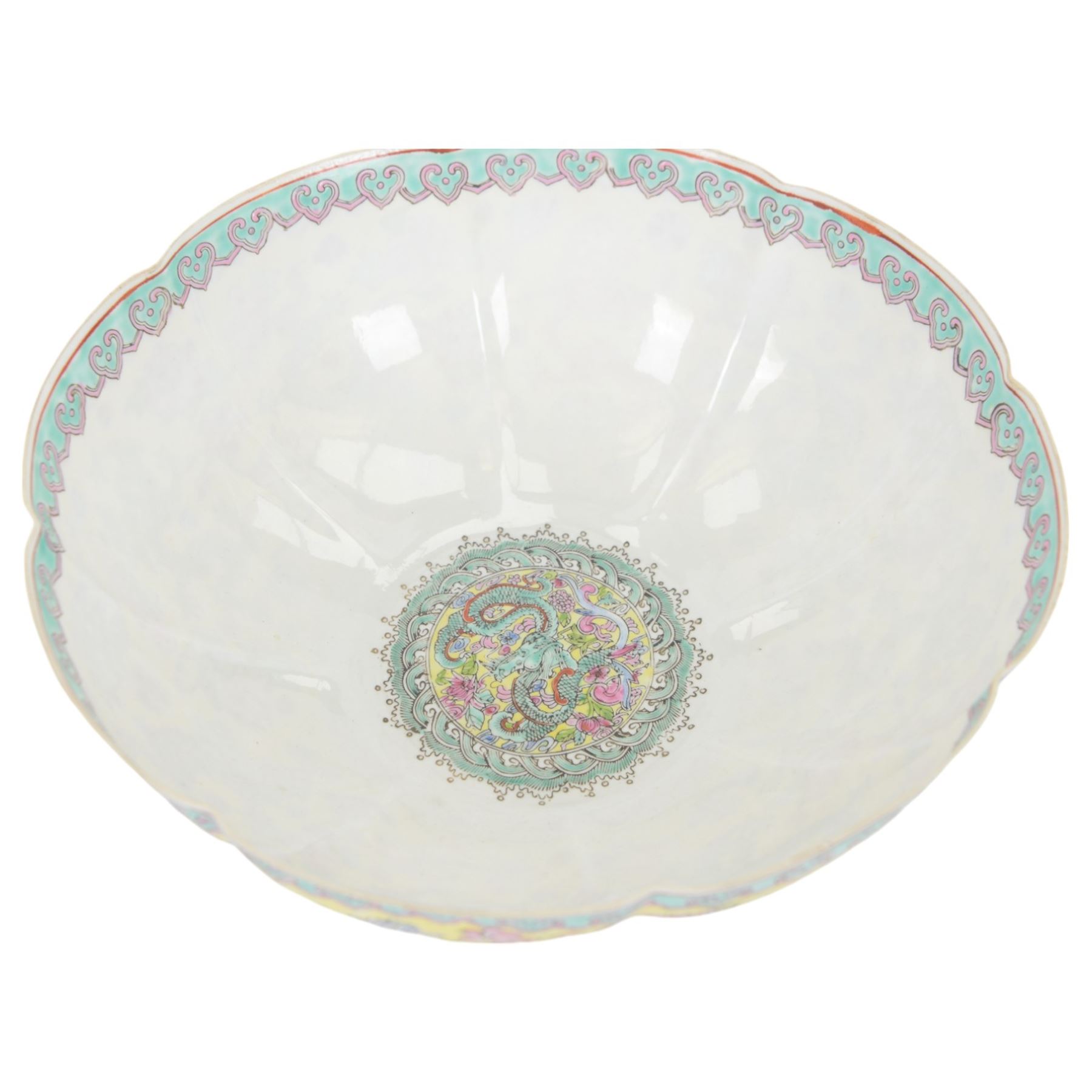 Chinese famille jaune eggshell porcelain bowl, decorated with dragons and foliage, upon hardwood stand, D26cm