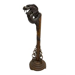 Mid to late 20th century carved hardwood lantern stand, carved with scaled dragon, on circular stepped base with carved decoration  