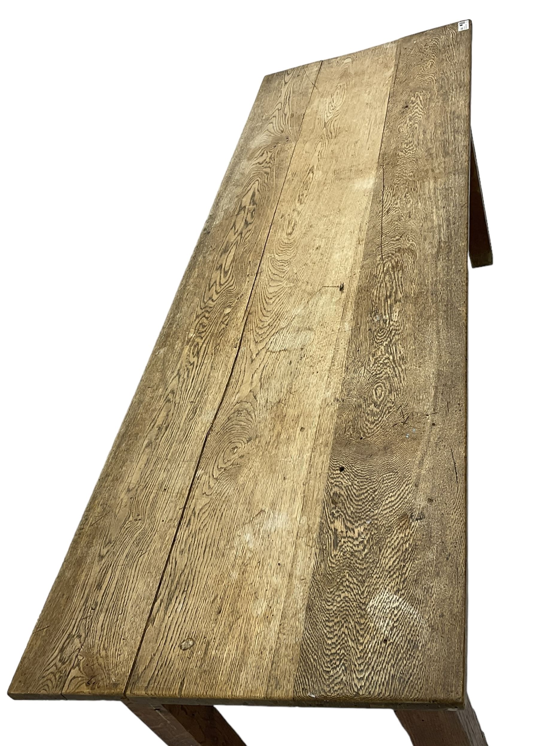 20th century oak refectory dining table, rectangular three plank top, on chamfered square supports 