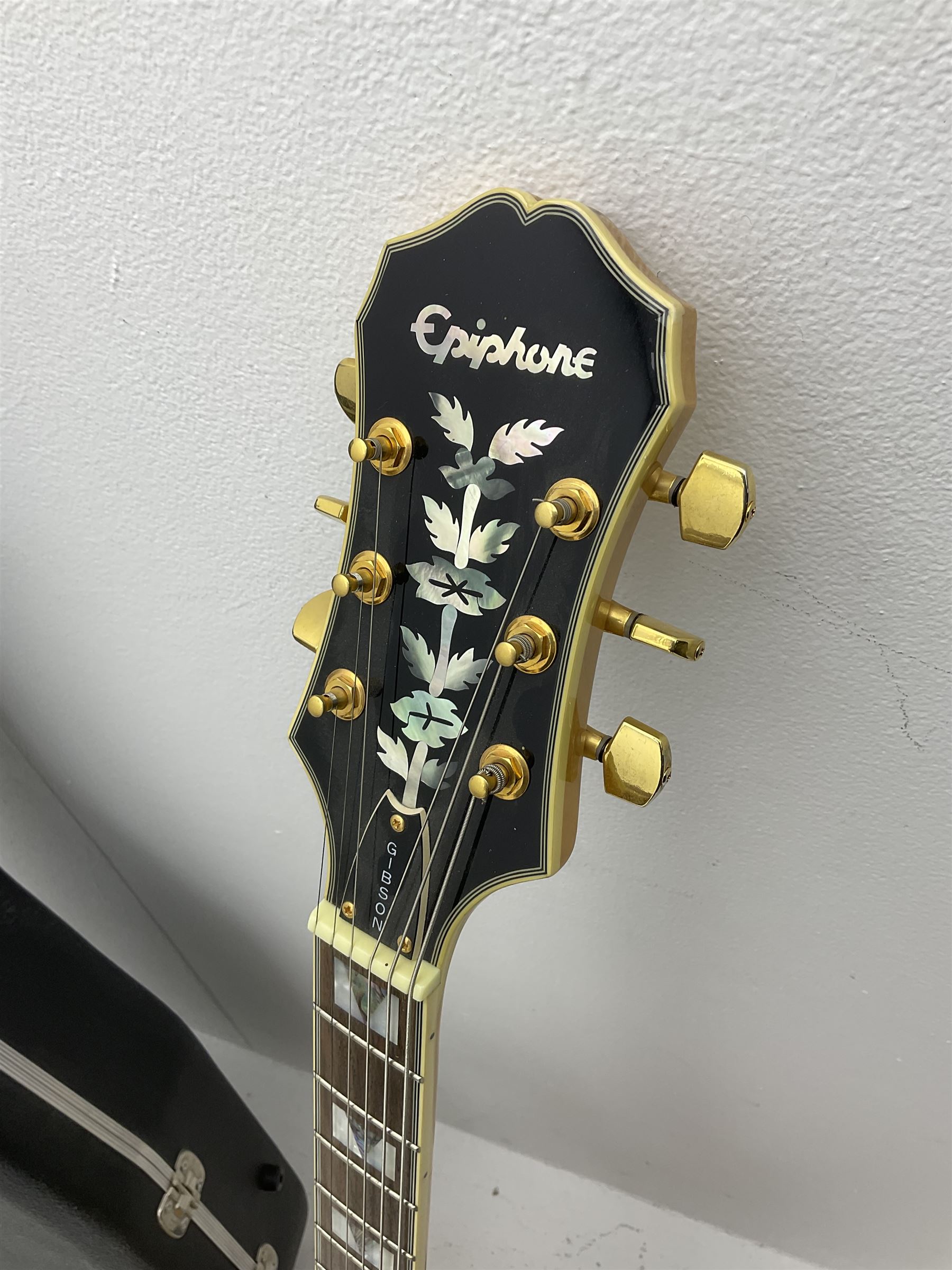Late 1990s Epiphone Sheraton left handed hollow body electric guitar by Gibson, serial no.99090334, bears label 'Made in Korea', L103cm, in Hiscox fitted hard case; with Squier SP-10 amplifier and XCG folding guitar stand (3)