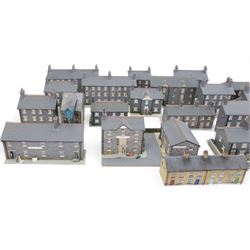 Thirty 00 gauge model railway trackside buildings, six by Martin's Models York including church and terraced houses and twenty-four kit-built examples all grey stone effect houses and farm buildings