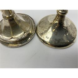 Early 20th century silver mounted specimen vase, of fluted tapering form, hallmarked Sheffield 1915, H18cm, together with a further silver mounted specimen vase, hallmarked for Birmingham, (2)