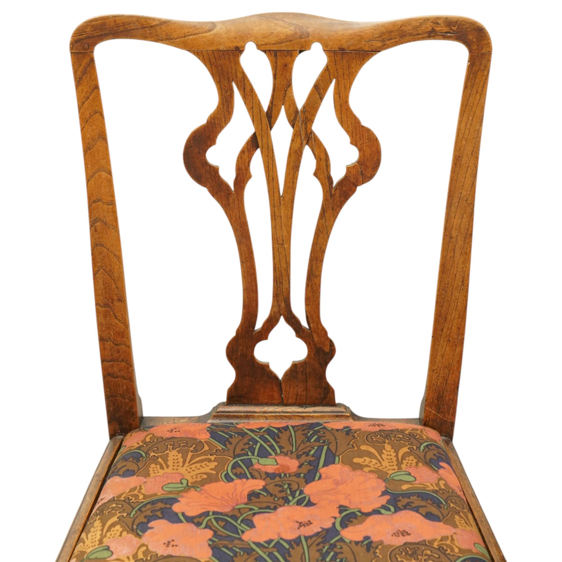 George III oak drop-leaf oval dining table with harlequin set of seven 18th century and later chairs including a comb-back Windsor, the table with turned gatelegs united by box stretcher, shaped apron extending to 212cm, the chairs of various forms, three Windsor carvers, a comb-back Windsor, plus a set of three Georgian mahogany dining chairs, pierced splat backs, with matching drop-in upholstered seats