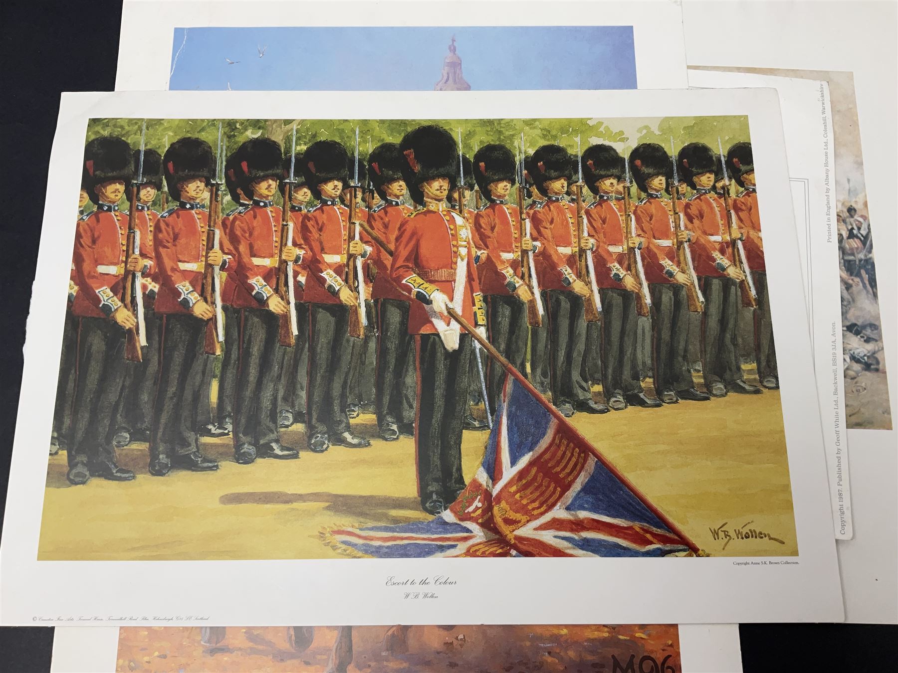 Large poster entitled 'Crests and Badges of the British Army in Daily Use 56 x 86cm; together with twenty-five colour prints of military interest including Crimean War, Boer War, WW2 etc; various sizes; all unframed