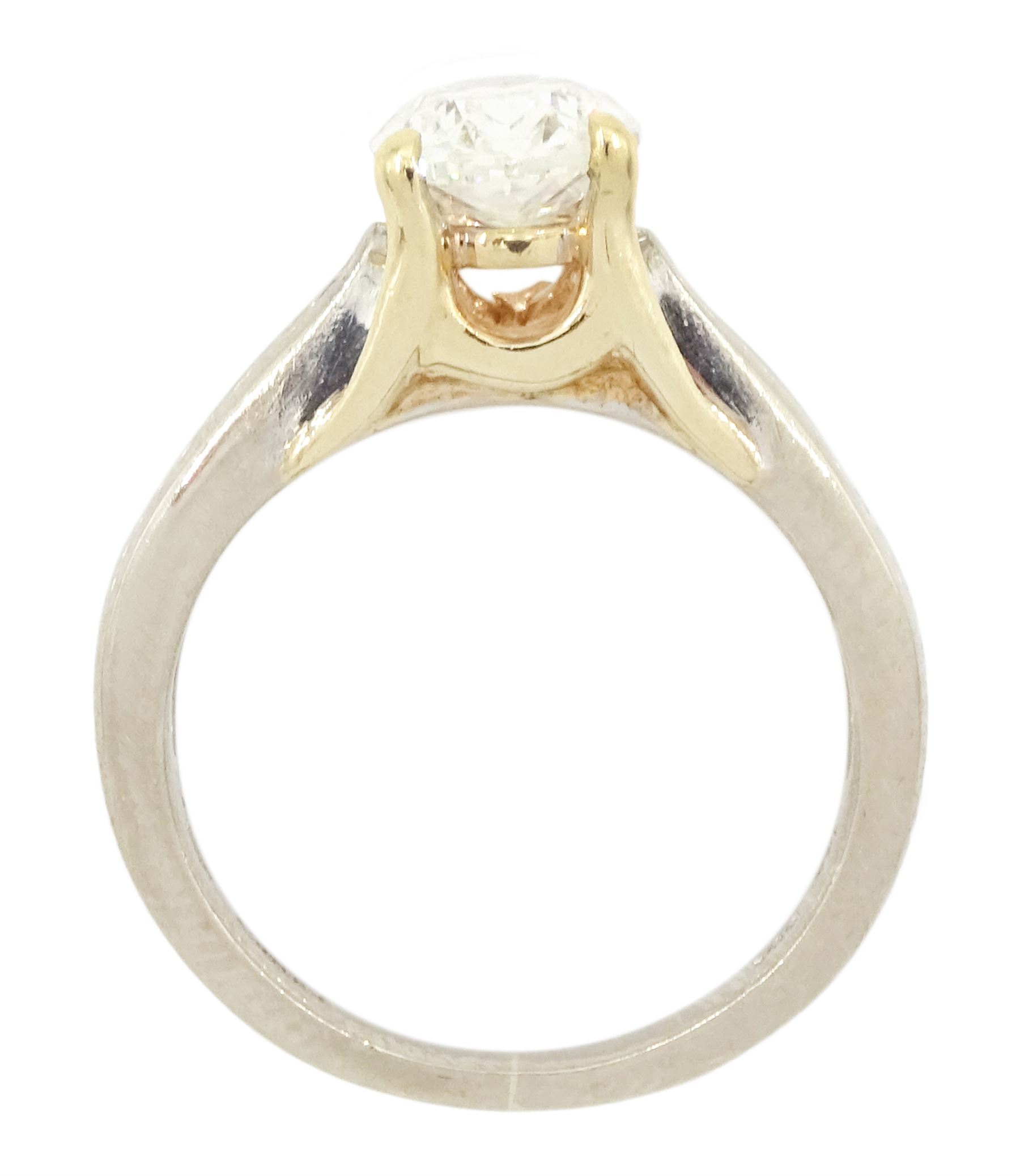 Gold single stone oval cut diamond ring, with round brilliant cut diamond shoulders, hallmarked 14ct, principal diamond approx 1.55 carat, total diamond weight approx 1.75 carat