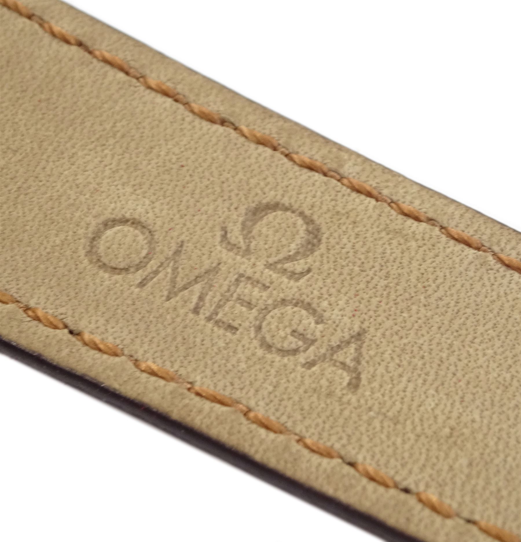 Omega De Ville gentleman's 18ct gold quartz presentation wristwatch, Ref. 73201412, champagne dial with date aperture, on original brown leather strap with gilt buckle, box with warranty card dated 2004