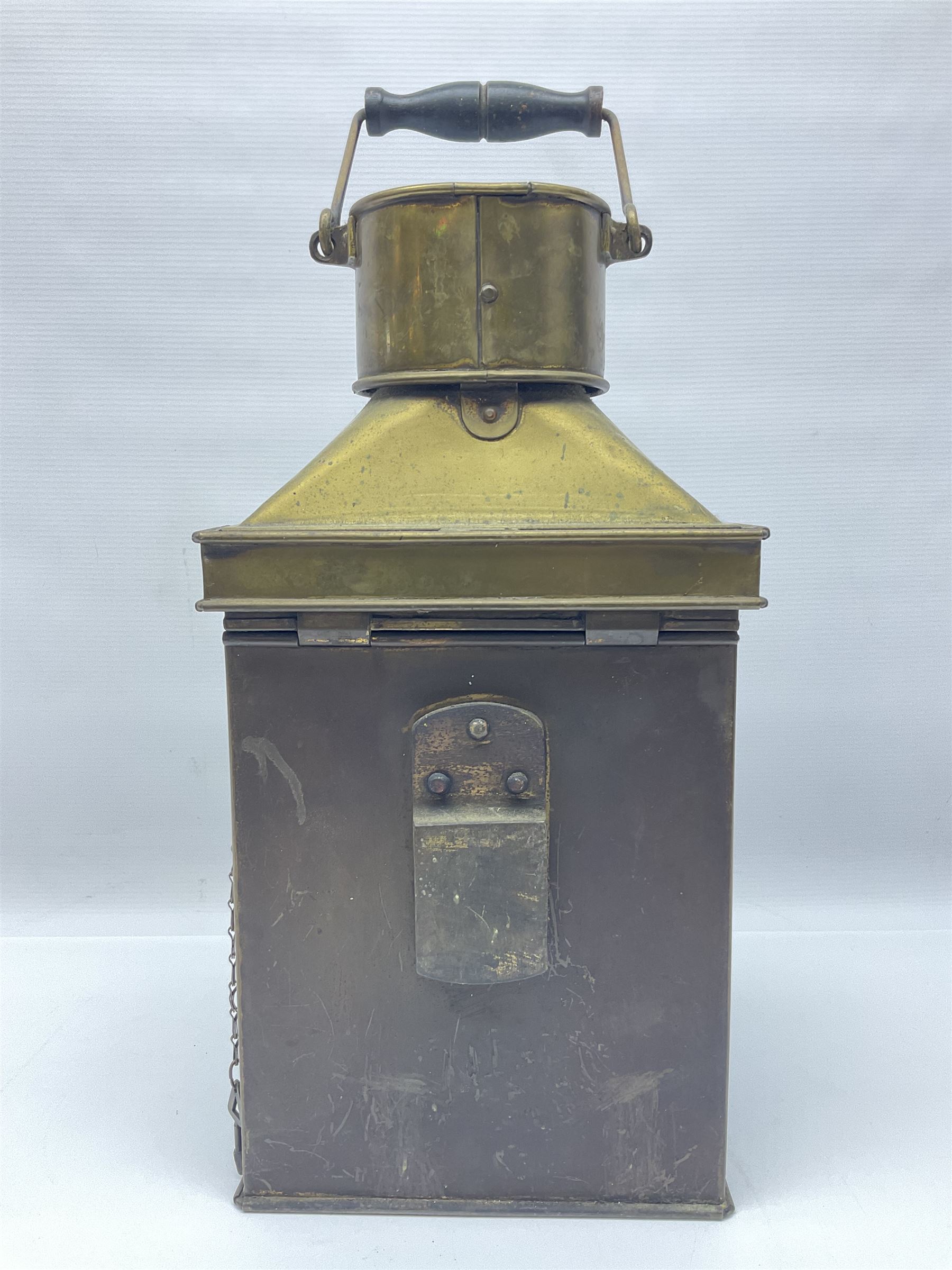 Large brass maritime lamp by Griffiths & Sons Birmingham with swing handle, threaded mounting bracket and associated oil burner, H41cm excluding handle
