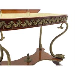 Late 20th century French style gilt mounted mahogany bijouterie table, the hinged lid glazed with bevelled glass and banded in figured walnut enclosing cushioned interior, fitted with foliate moulded gilt metal bands, the frieze decorated with trailing linen swags, on four cast gilt metal scaled serpentine dolphin supports, shaped platform undertier, four splayed supports with leaf mounts