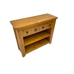 Rustic pine dresser, fitted with two drawers over two open shelves