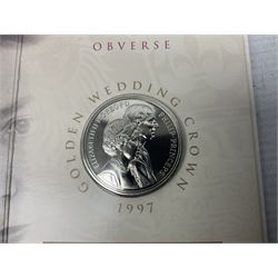 The Royal Mint United Kingdom 1984 brilliant uncirculated coin collection, 1997 and 2001 commemorative crown coins, 1997 old round one pound, all in card folders and four sterling silver medallic first day covers from the 'Great Britons' collection housed in a blue folder