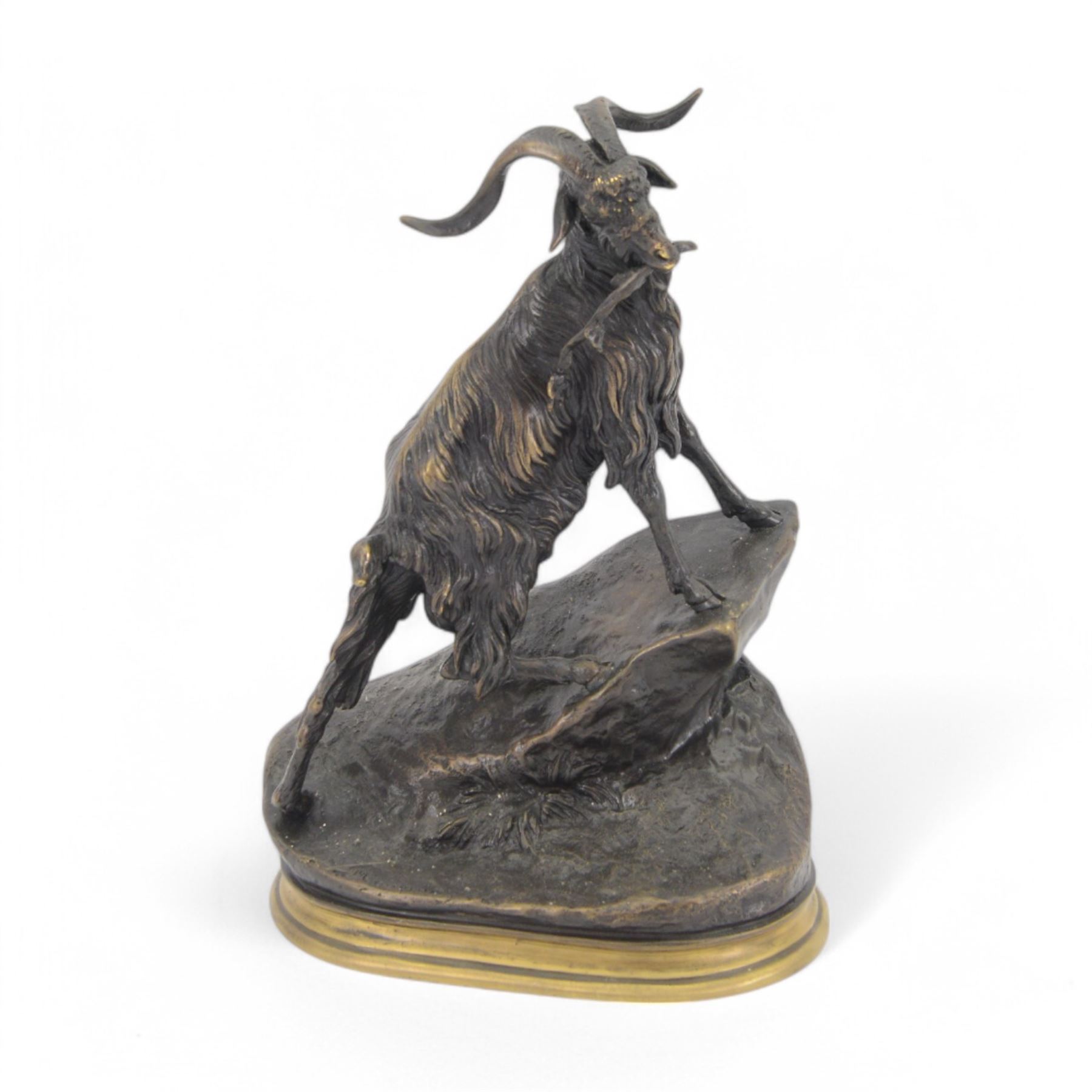 After Jules Moigniez, bronze figure of a goat climbing a rock, on oval plinth, inscribed signature, H28cm