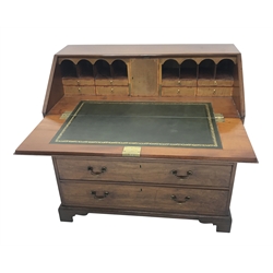  George lll mahogany bureau with crossbanded fall front, the interior with cupboard, drawers and compartments above four long drawers with brass swan neck handles, on shaped bracket feet, W107cm, D59cm, H104cm   