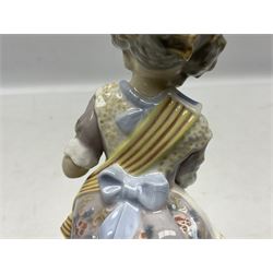 Lladro figure, Miss Valencia, modelled in traditional Valencian dress with basket of oranges, sculpted by Juan Huerta, with original box, no 1422, year issued 1982, year retired 1997, H18cm