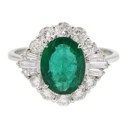 18ct white gold oval emerald, tapered baguette and round brilliant cut diamond cluster ring, stamped 750, emerald 1.40 carat, total diamond weight approx 0.80 carat