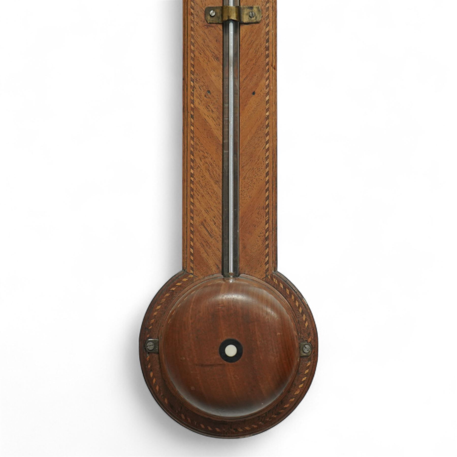 Stampa- George III early 19th-century mercury stick barometer in a mahogany case with a broken pediment and round base, case with chequered inlay to the edge and cistern cover, visible full length bulb cistern tube recording barometric air pressure from 27 to 31 inches with predictions, rectangular silvered register and vernier, with a spirit thermometer indicating the temperature in degrees Fahrenheit.
Mercury present in good condition.
Stampa is recorded as working in London as a barometer and looking glass manufacturer.