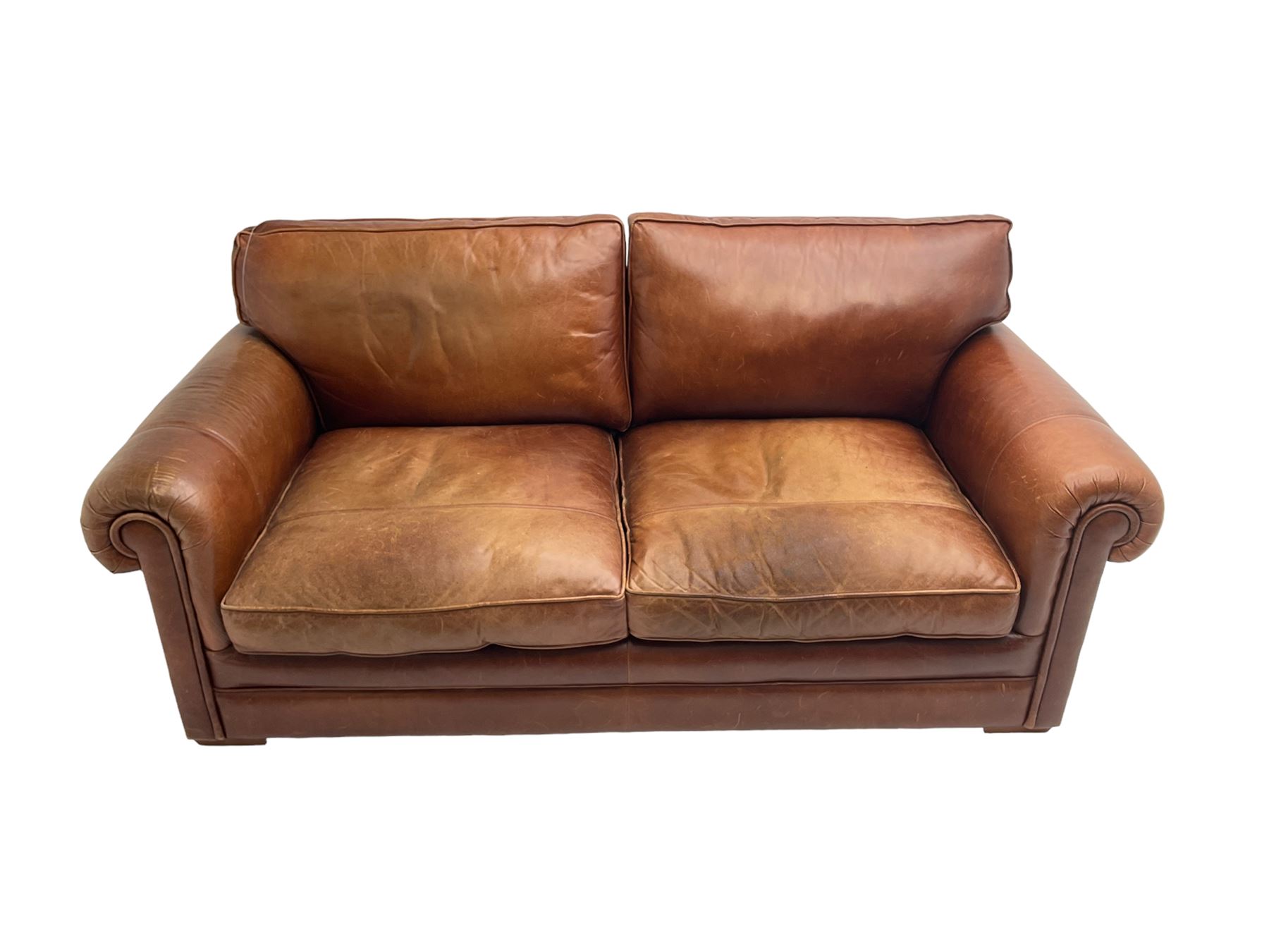 Large two seat sofa upholstered in tan 'Derwent' leather (W200cm D100cm H85cm), and matching armchair (W95cm)