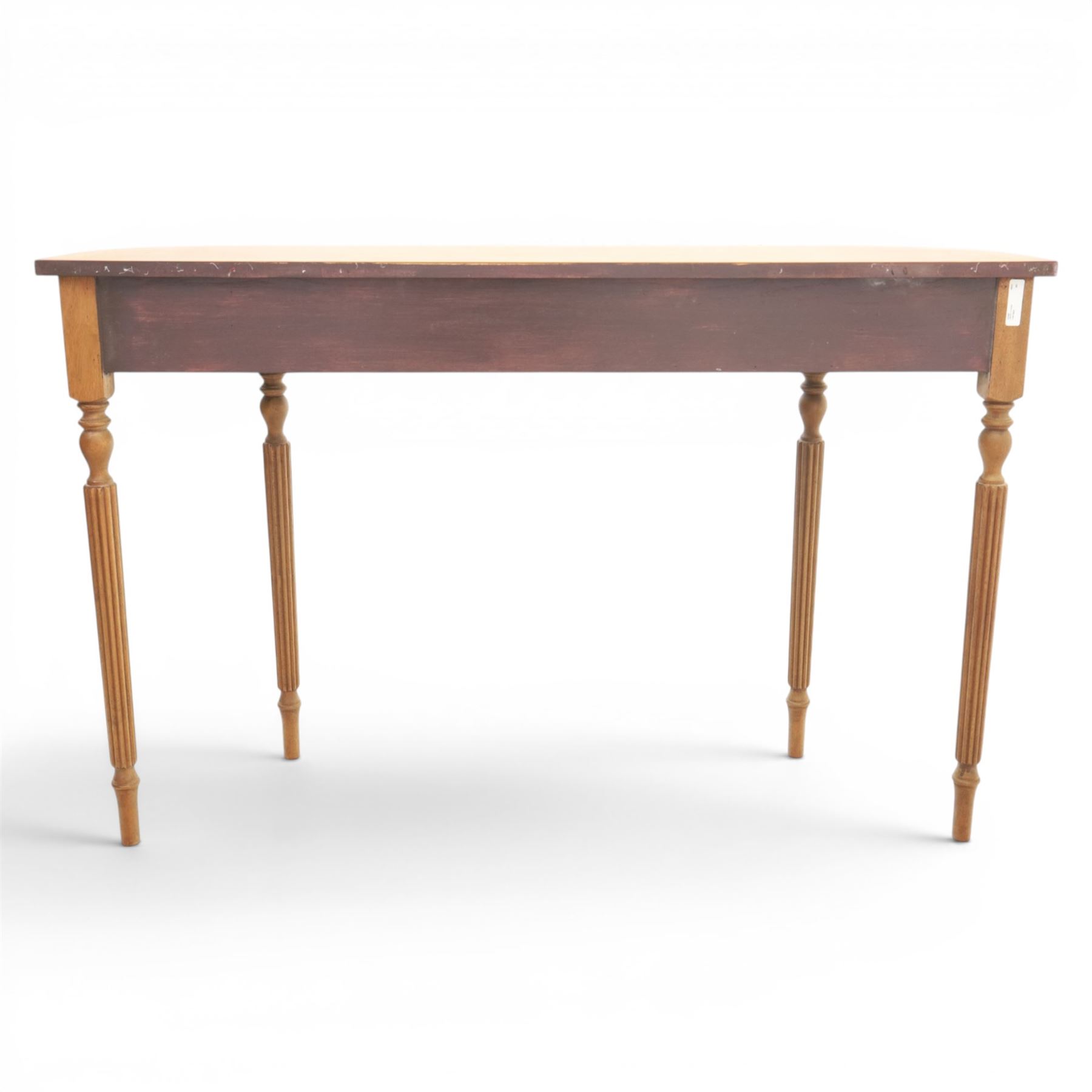 Traditional design walnut D-end hall table, figured top and sides, two frieze drawers with brass handles raised on fluted and turned supports