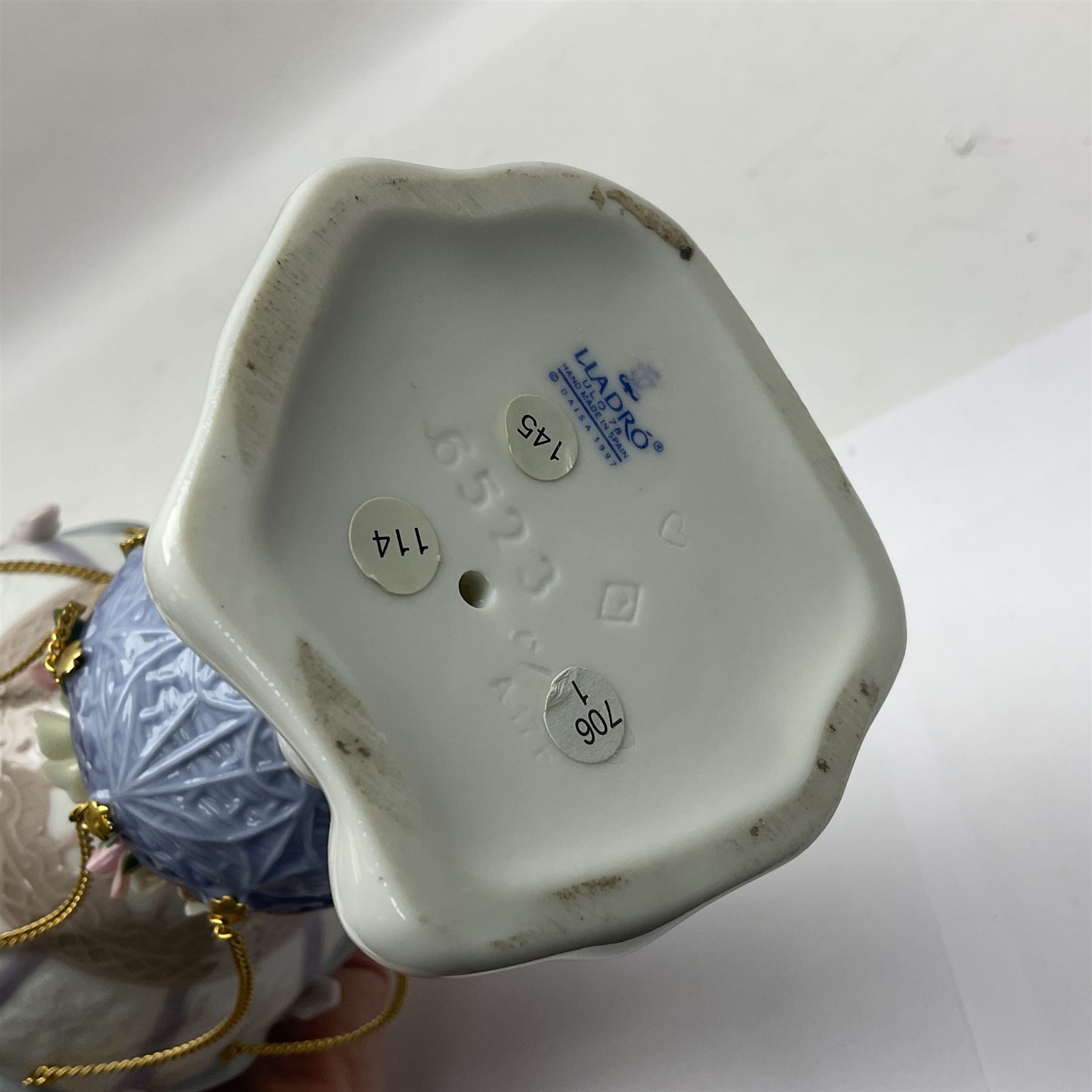 Lladro Flying High, modelled as a hot air balloon, with brass chains to suspended blossom filled basket, no 6523, with original box, H23cm