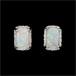 Pair of 9ct white gold opal and diamond stud earrings, stamped 375