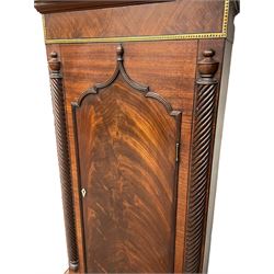 Nathaniel Dumville of Stockport - 8-day brass inlaid mahogany longcase clock c1840, swans neck pediment with ball and spire finials and wooden paterae, recessed break arch hood door flanked by rope twist pilasters, trunk with conforming pilasters and gothic ogee topped door, canted plinth raised on bracket feet, fully painted break arch dial with moon work and spandrels depicting the four seasons, centre with Roman numerals, minute track, subsidiary date and seconds dials, matching stamped brass hands, four pillar movement with an anchor escapement, rack striking on a bell. With weights and pendulum.
The Dumville family were prevalent Cheshire clockmakers working in Stockport 1820-42.
