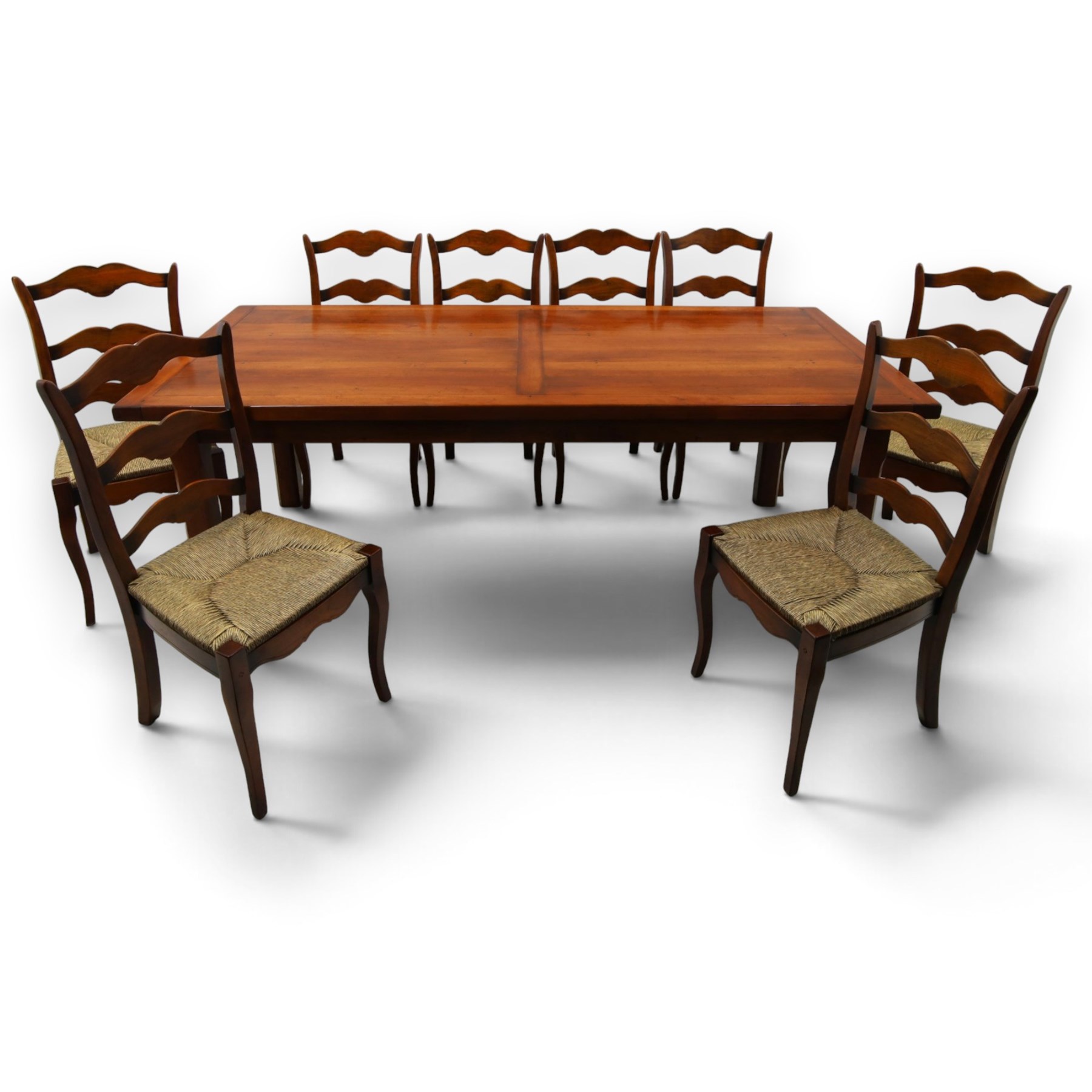 French cherry wood extending dining table, rectangular top on square chamfered supports with two additional leaves; with Batheaston - set of eight cherry wood waived ladder back dining chairs with rush seats (W46cm H98cm)