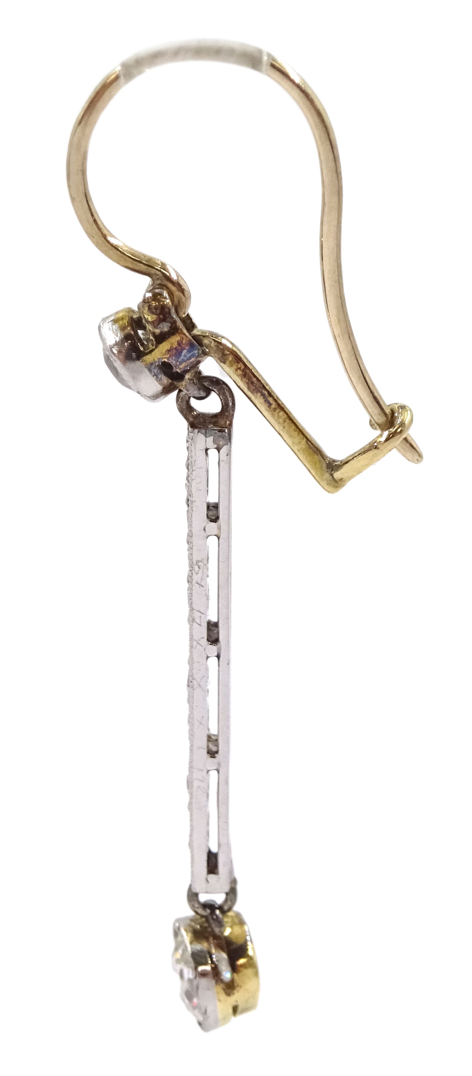 Pair of Art Deco platinum and gold, milgrain set old cut diamond pendant stud earrings, total diamond weight approx 0.70 carat
