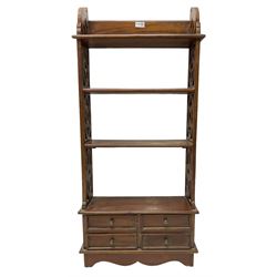 Small 20th century Chinese hardwood open bookcase, fitted with three open shelves flanked by pierced uprights, with four drawers to base