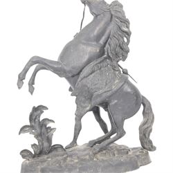 Three spelter Marley Horse figures, after Guillaume Coustou, each modelled as a rearing horse restrained by  groom, tallest H41cm