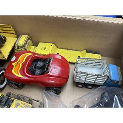 Tonka - fourteen pressed steel vehicles including Pick-up Truck, Tractor Digger, Mobile Crane, Trencher, Beach Buggy, two Bulldozers, Digger, Low Loader, Farm Trucks etc; and small quantity of spare parts (14)