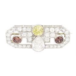 Early 20th century platinum diamond brooch, milgrain set with a pear cut faint brown diamond of approx 1.50 carat, an old cut fancy yellow / green diamond of approx 0.70 carat, and two old cut fancy orange / brown diamonds of approx 0.40 carat and 0.35 carat, surrounded by old cut white diamonds in an openwork setting, total white diamond weight approx 1.45 carat