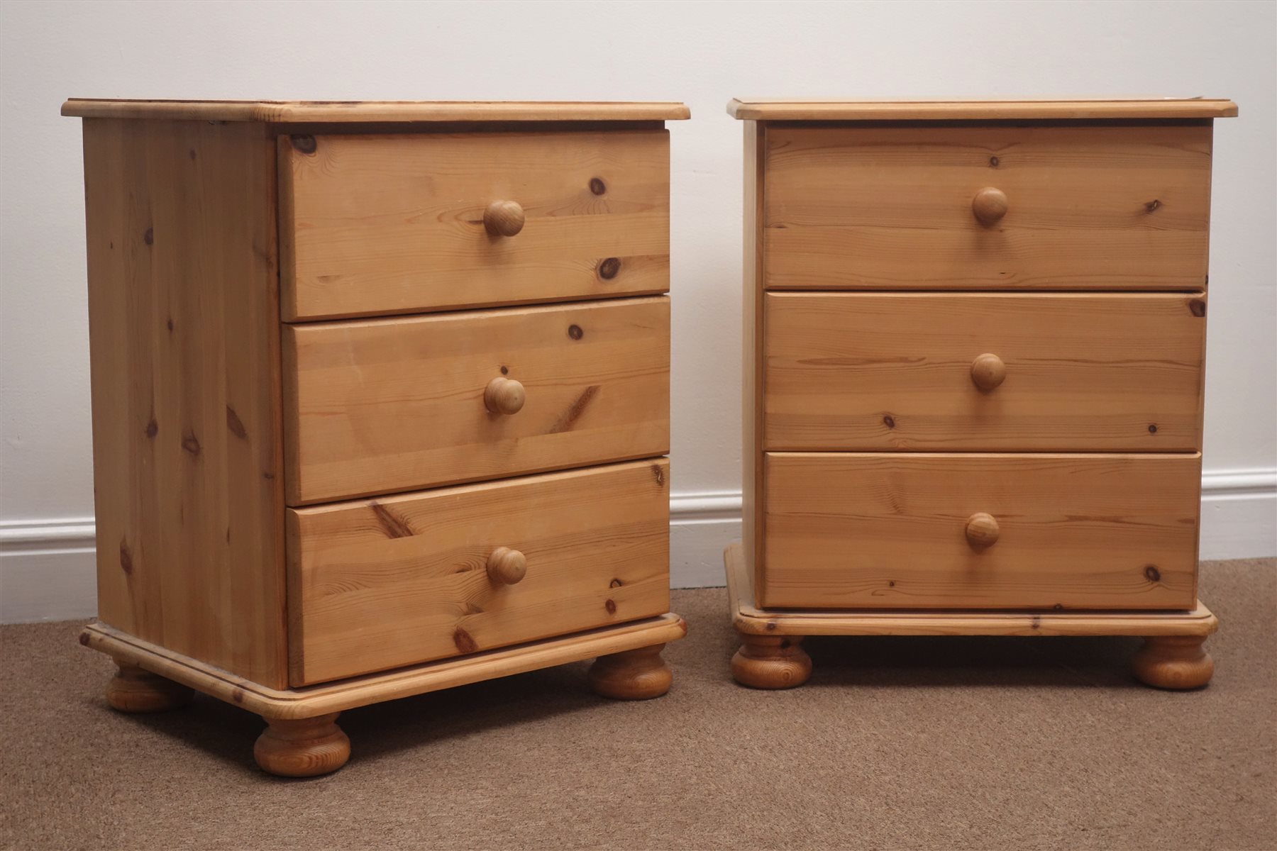 Pair solid pine bedside chests, three drawers, bun feet, W51cm, H62cm