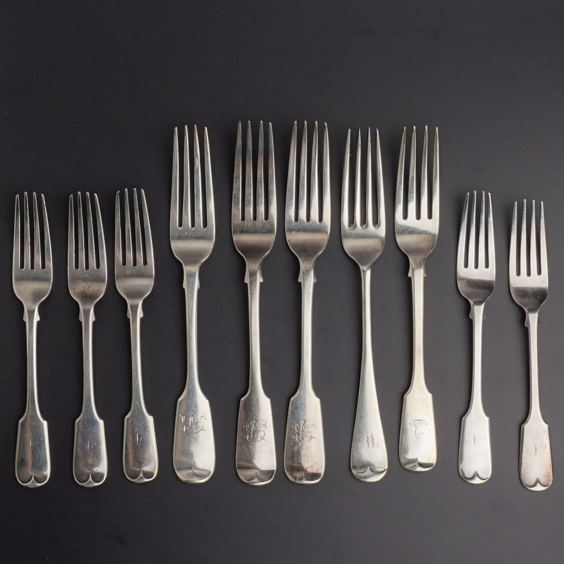 Five Victorian silver fiddle pattern dessert forks London 1859 Maker The Portland Co. three Victorian table forks, various dates and two other table forks