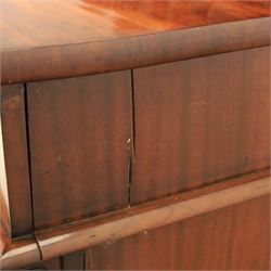 Mid Victorian mahogany pedestal sideboard, the rectangular top with raised back centred by a carved shell within scrolling acanthus and foliate cresting, over a central shaped frieze drawer flanked by two short drawers, above a kneehole recess, flanked by panelled cupboard doors with carved corbel supports, enclosing shelved interiors
